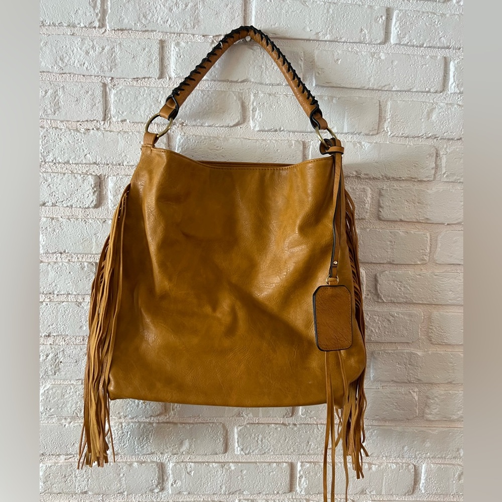 Faux leather yellowish tan fringe purse